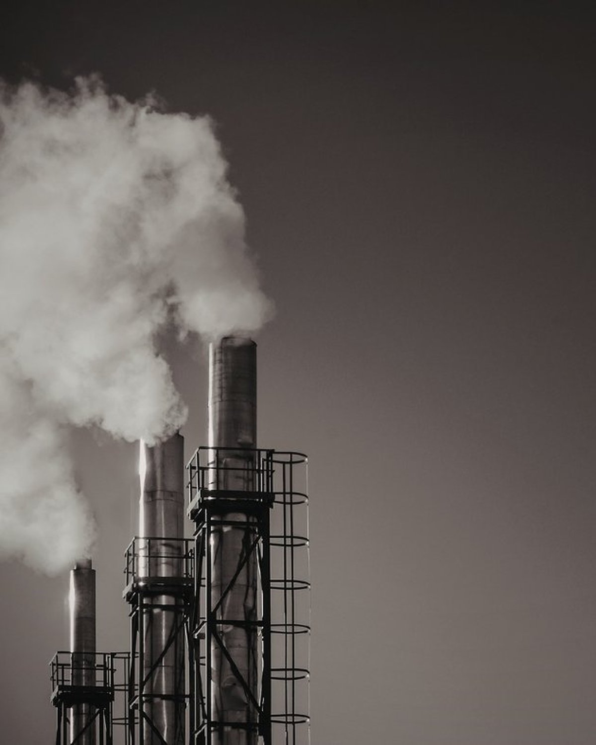 Quebec industrial plant smokestacks — industrial mechanics, plant shutdowns and CWB welding by CFI Industries in Saguenay