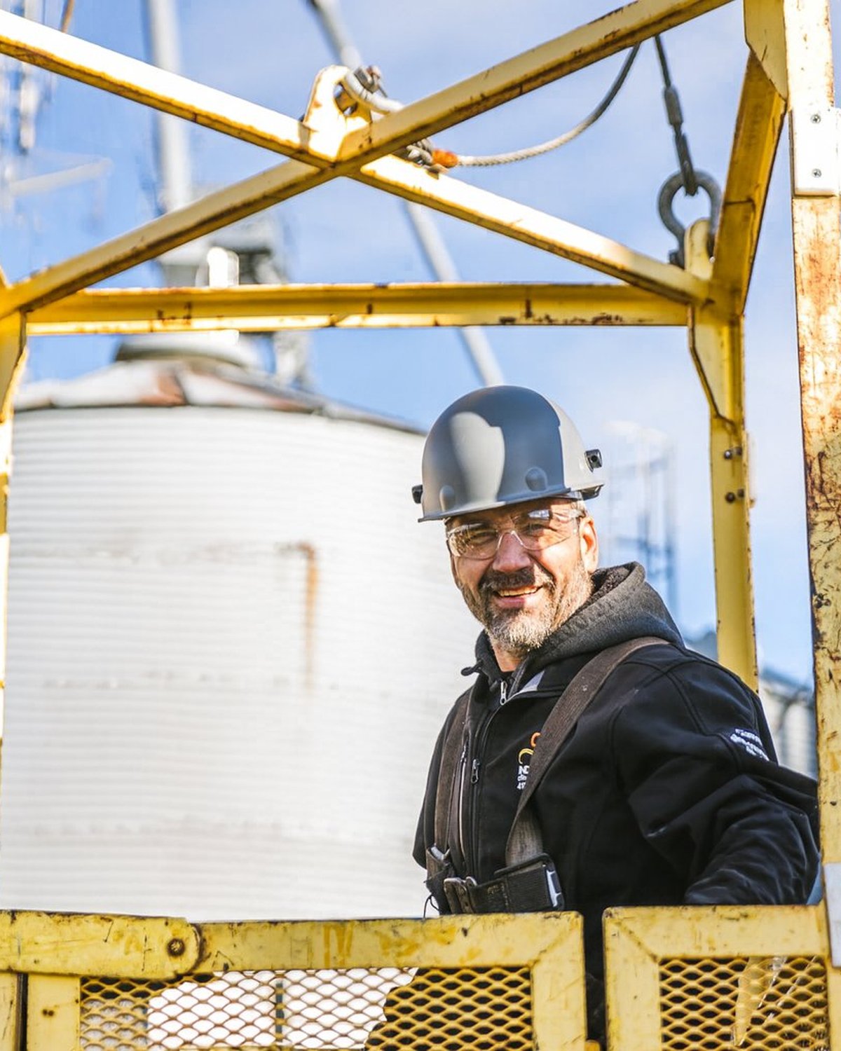Yanick Laberge, founder and owner of CFI Industries, on a grain bin installation site in Saguenay–Lac-Saint-Jean — 30 years of experience in Quebec heavy industry