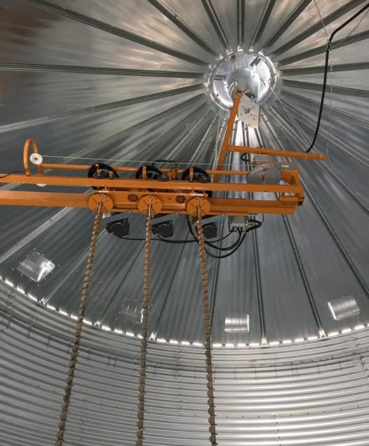 Interior view of grain silo with dryer and top handling system — installation by CFI Industries for CJM Maltais farm in Quebec